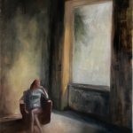 Picture of a woman in a big room looking outside the window