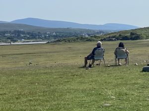 Photo of old people looking at landscape